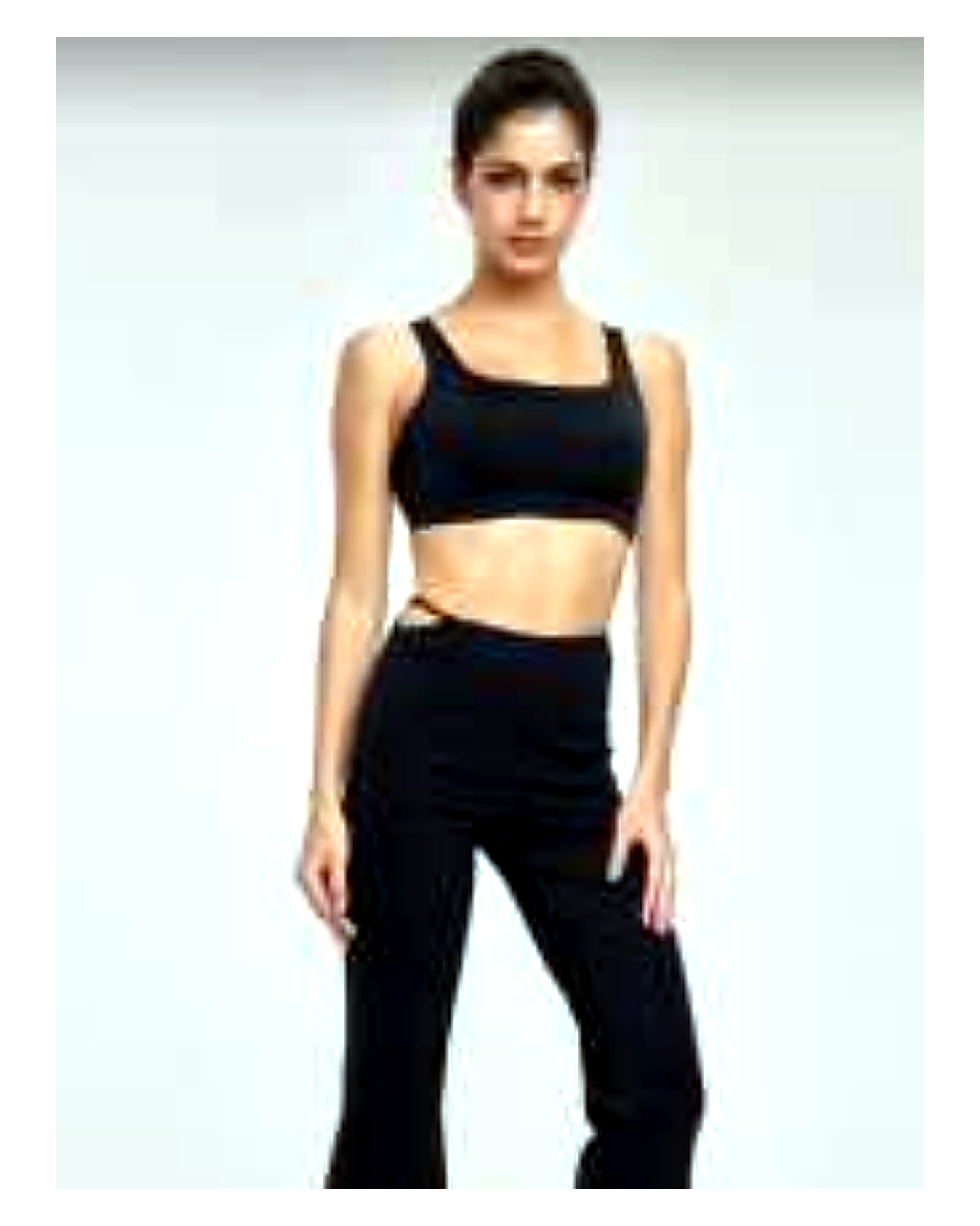 Sports bra and leggings detail for custom activewear manufacturing